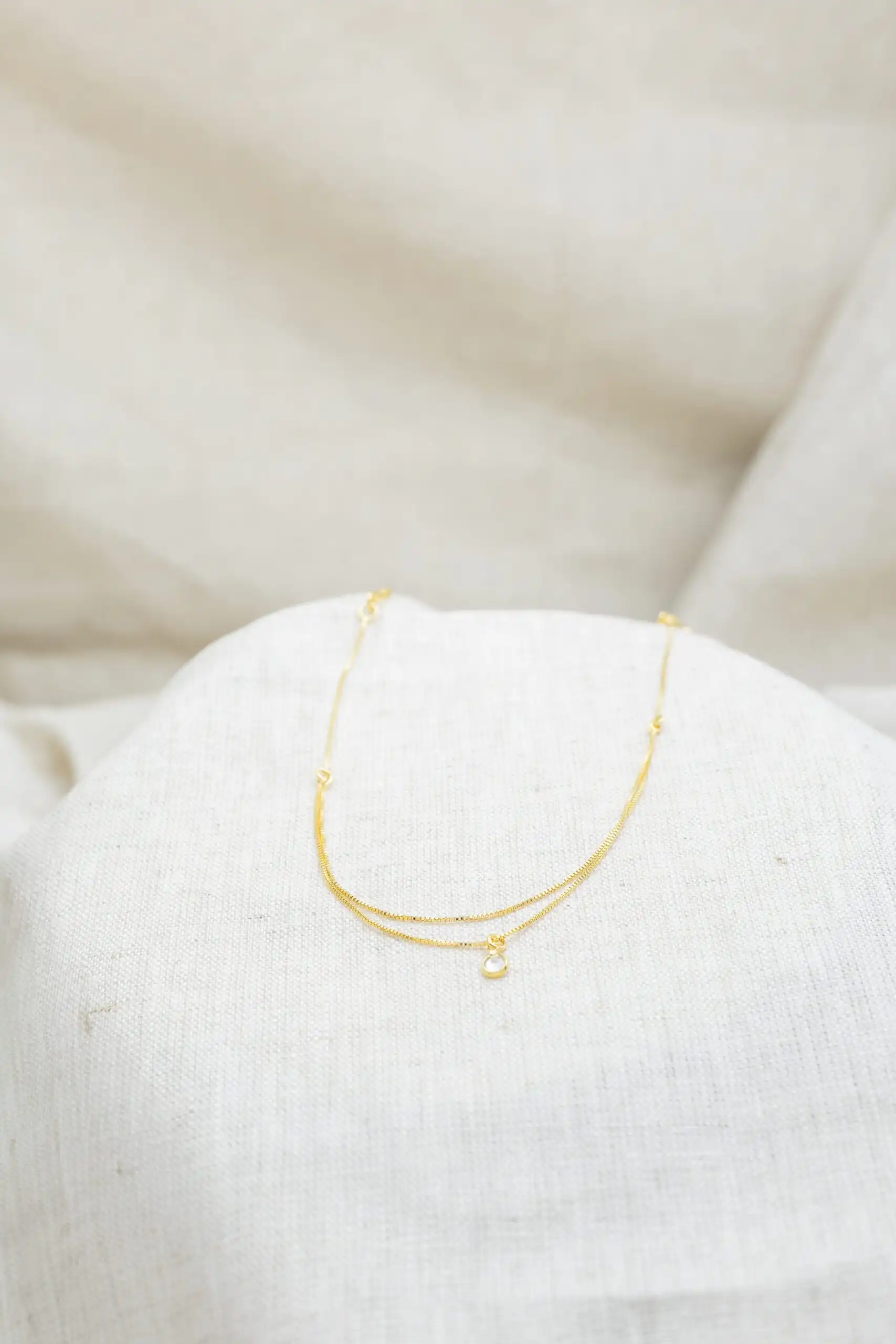 Tornozeleira com Ponto de Luz Banhada em Ouro 18k - Imagem 2