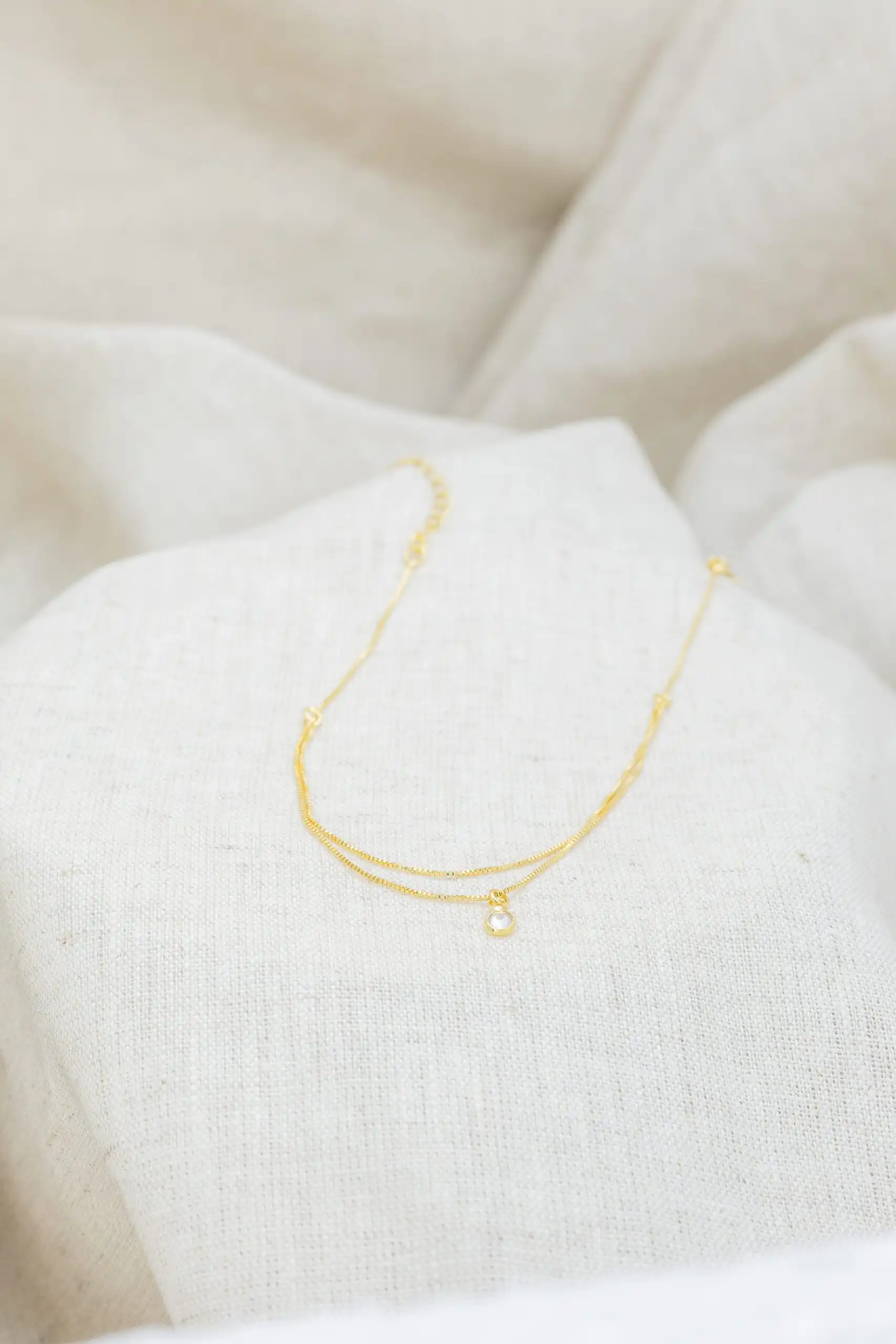 Tornozeleira com Ponto de Luz Banhada em Ouro 18k - Imagem 3